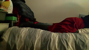 Mistress And Her Slave Indulge In Leather Boot Fetish On The Bed